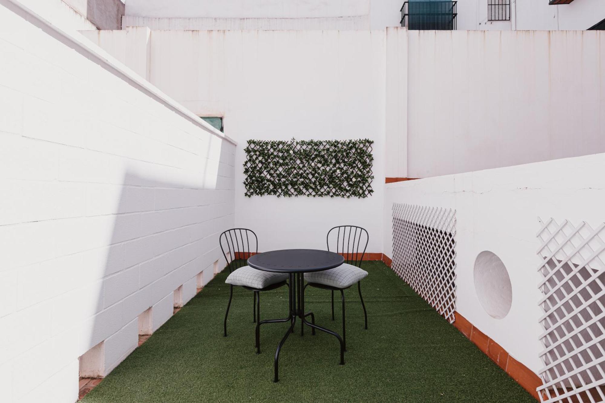 Quiet Terrace In Triana Close To The River Sevilla